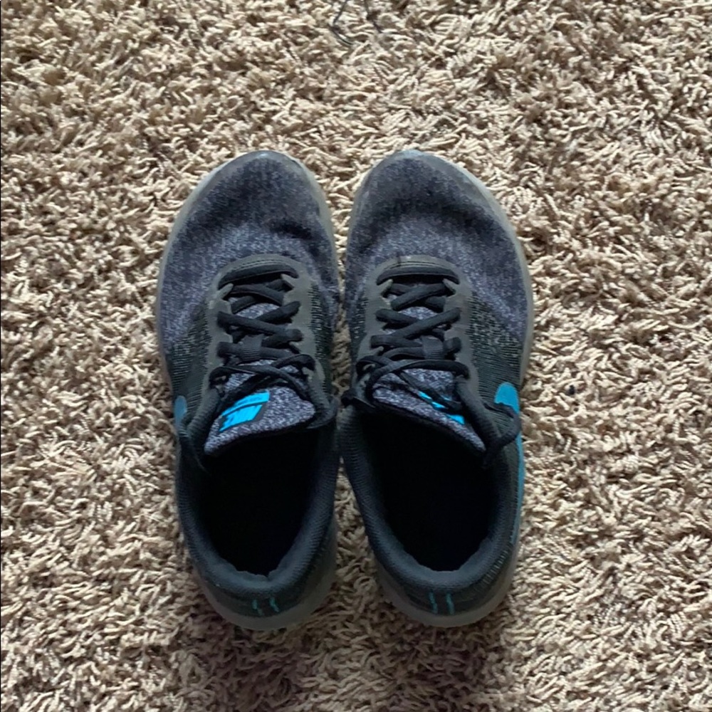 Greyish black Nike shoes